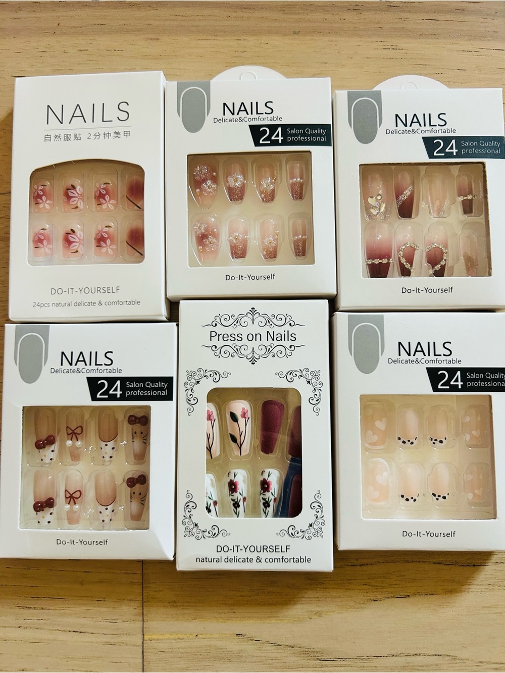 Lot of assorted press-on nails.  Various sizes